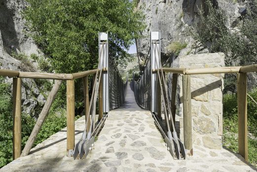 suspension bridge for pedestrians near the castle of zuheros in andalusia
