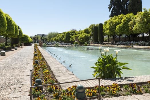 moorish gardens with fountains in alcazar cordoba