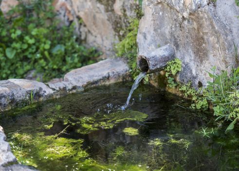 fresh drinking water from a top in the mountains of andalusia