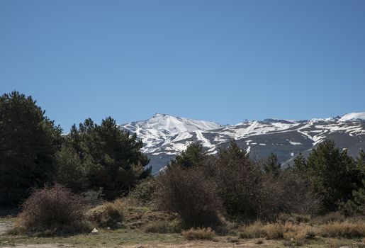 snow on the mountain tops of the sierra nevada in andalusia spain