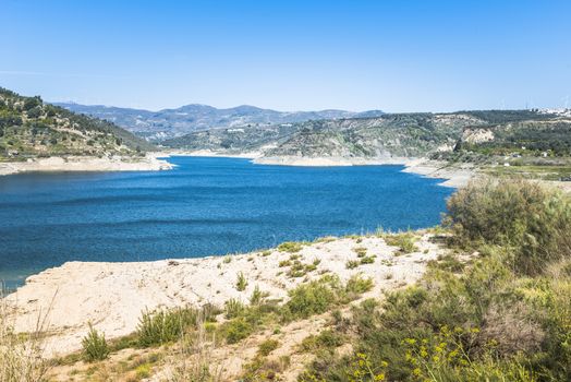 lake near beznar in andalusia with blue water and nice landscape
