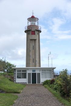 Lighthouse Ponta de Sao Jorge - a famous tourist sight at the north coast of Madeira.