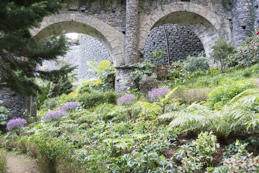 flower garden in Monte Madeira with old bridge