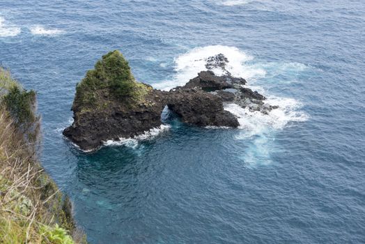 Famous rock in the atlantic ocean near Seixal om the portuguese island Madeira