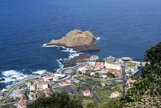 View of the village of Porto Moniz with lava-rock pool, Madeira Island, Portugal