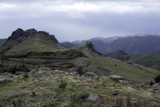 mountains on madeira island with rocks and blue sky