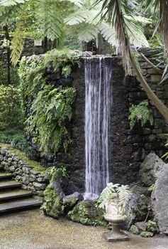 Waterfall in the tropican Monte Palace Garden. Funchal, Madeira, Portugal.