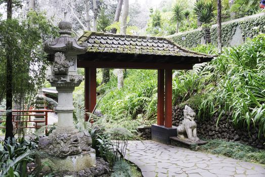 Monte Tropical Gardens with red Japanese style pavilions, Funchal, Madeira island, Portugal