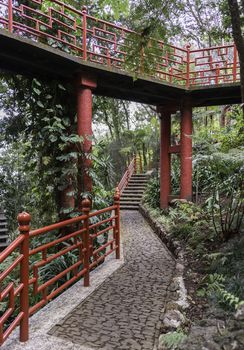 botanical public gardens in Funchal Madeira with the japanese part with red bridges and ornaments