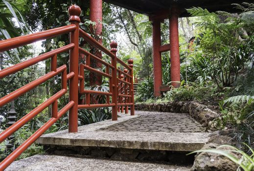 botanical public gardens in Funchal Madeira with the japanese part with red bridges and ornaments