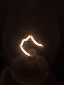 close up light bulb filament macro detail bright; essex; england; uk