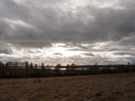 moody skyline clouds over autumn farm field ; essex; england; uk