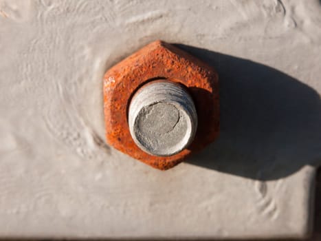 close up of large rusty bolt and screw head; essex; england; uk