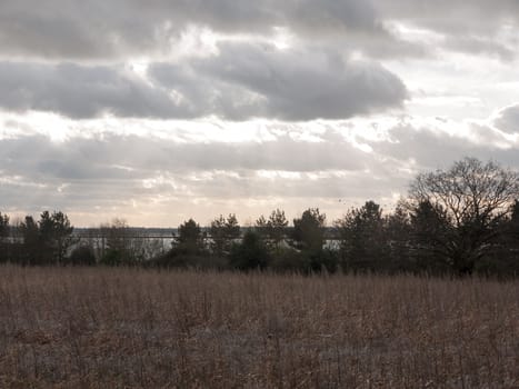 moody skyline clouds over autumn farm field ; essex; england; uk