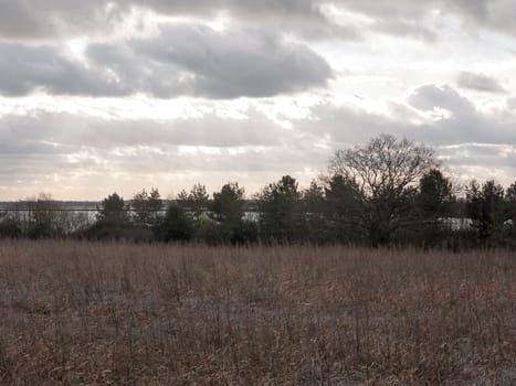 moody skyline clouds over autumn farm field ; essex; england; uk