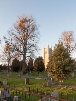 church cemetery with graves and trees country ; essex; england; uk