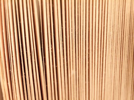 close up texture of book pages side view; essex; england; uk