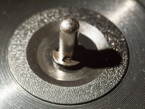 close up of metal vinyl centre music player record; essex; england; uk
