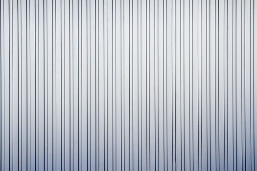 Aluminium dark list with metal sheet fence.