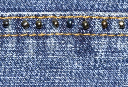 Blue jeans texture background and button and seam