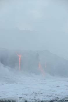 lava flow to pacific ocean at big island, hawaii