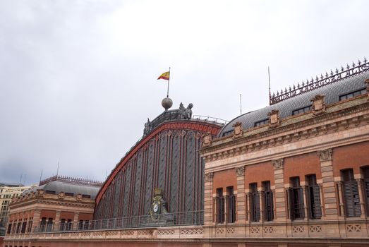 Exterior view of the facade of Atocha train station in Madrid, Spain