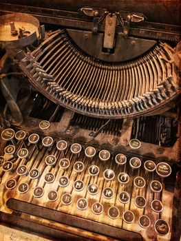 Close-up of a rusty vintage typewriter. Retro style photo.