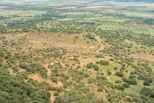 The view towards the North-West from the Koranna Mountain near Excelsior. A 4x4 road and two motorcycles are visible