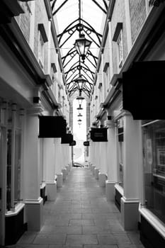 Black and white scene. Shopping centre in Newport Pagnell Town.