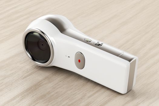 360 degree camera on wood background