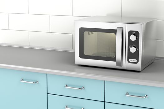 Silver microwave oven in the kitchen 