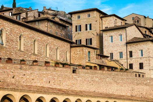 A cityscape of medieval houses of Assisi Italy