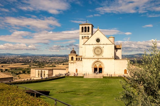 St. Francis of Assisi Church with the statue of St. Francis on a horse in the foreground. St. Francis is the patron saint of Italy. The bell tower can be seen from miles away.