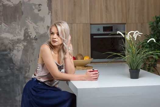 woman drinking coffee in the morning at home