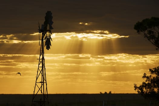 Australian windmill in the countryside of Queensland, Australia.