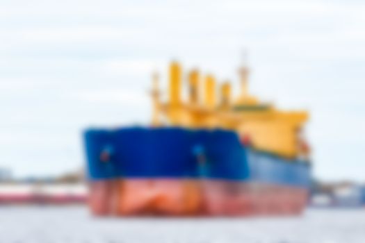 Cargo ship - soft lens bokeh image. Defocused background