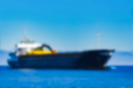 Cargo ship - soft lens bokeh image. Defocused background