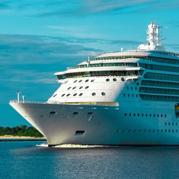 Luxury cruise liner underway. Tour travel and spa services