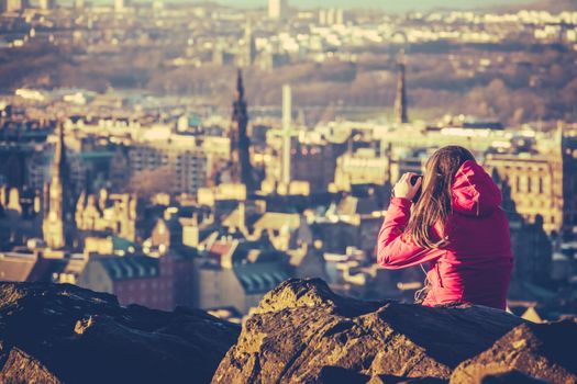 Young Woman Tourist Photographer In Edinburgh Scotland At Sunset