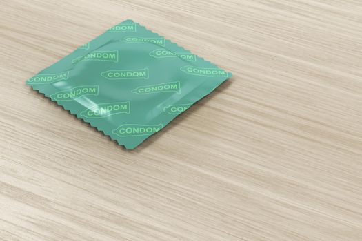 Condom packaging on wood background