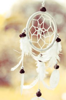 Dream catcher and abstract bokeh background