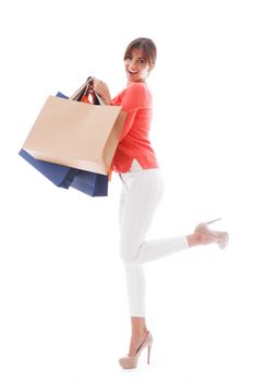 Woman with shopping bags isolated on white background