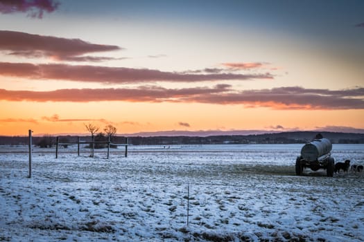 French countryside sunrise with Alpes in far background