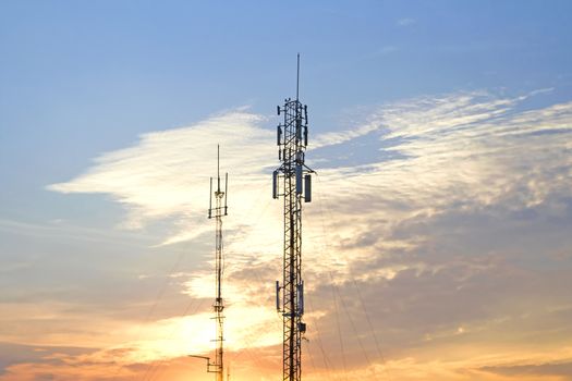 Mobile phone communication tower transmission  signal  leash on the evening
