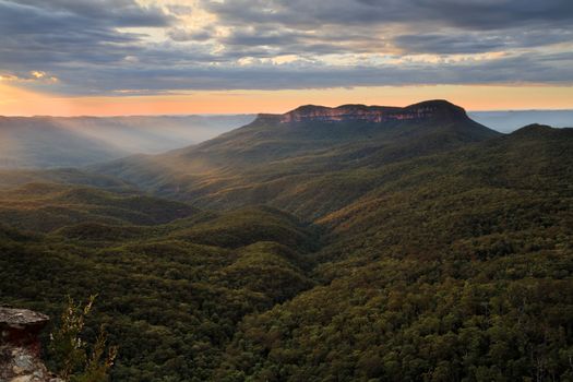 Sunlight into the valley.  Blue Mountains Australia with Mount Solitary