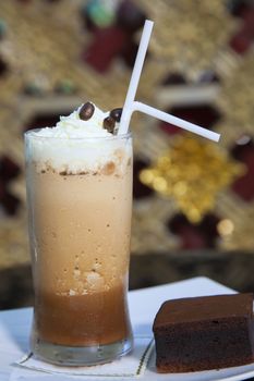 Cold coffee and bakery on a white plate