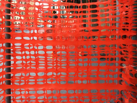 plastic orange fence in a construction site