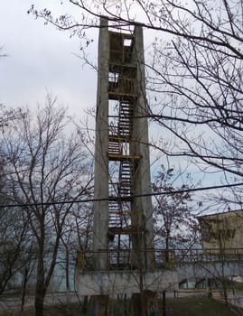 Ruined by the staircase from the house near the sea.Abandoned building.