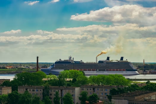 Large cruize liner. Passenger ship moored in old town