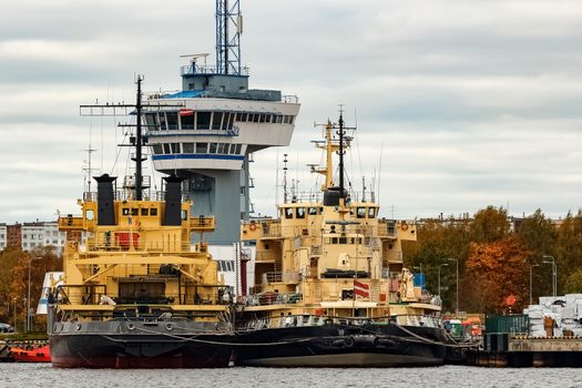 Yellow icebreakers moored at the port of Riga, Europe
